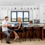 couple in kitchen with wine tilt and turn residential windows