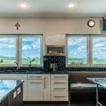 two double tilt and turn windows allow for a stunning view for whoever is working in this kitchen